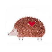 handmade brown enamel hedgehog brooch with a heart